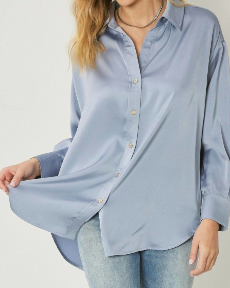 Front of a model wearing a size Large Satin Button Up Collared Top in Chambray in Chambray by entro. | dia_product_style_image_id:326806